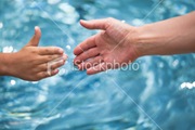 ist2_9494420-reaching-hand
